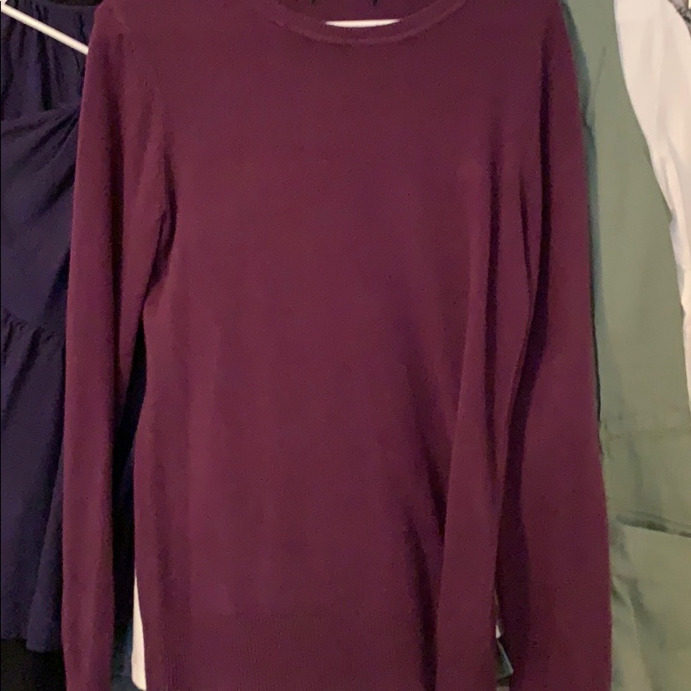 Plum color sweater. Tag missing. About size M